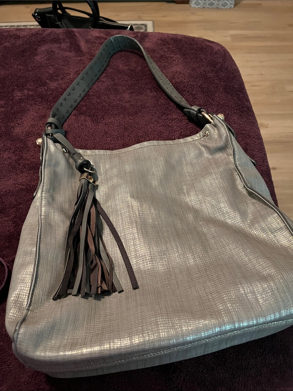 Sondra Roberts Slouch Metallic Gray Purse with Tassel Accent